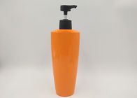 楕円形のオレンジ ペット プラスチック化粧品は空のローションの石鹸のびんの光沢の表面をびん詰めにします